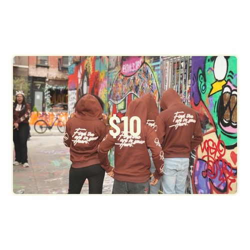 Three people wearing brown hoodies with text in front of a colorful graffiti wall.